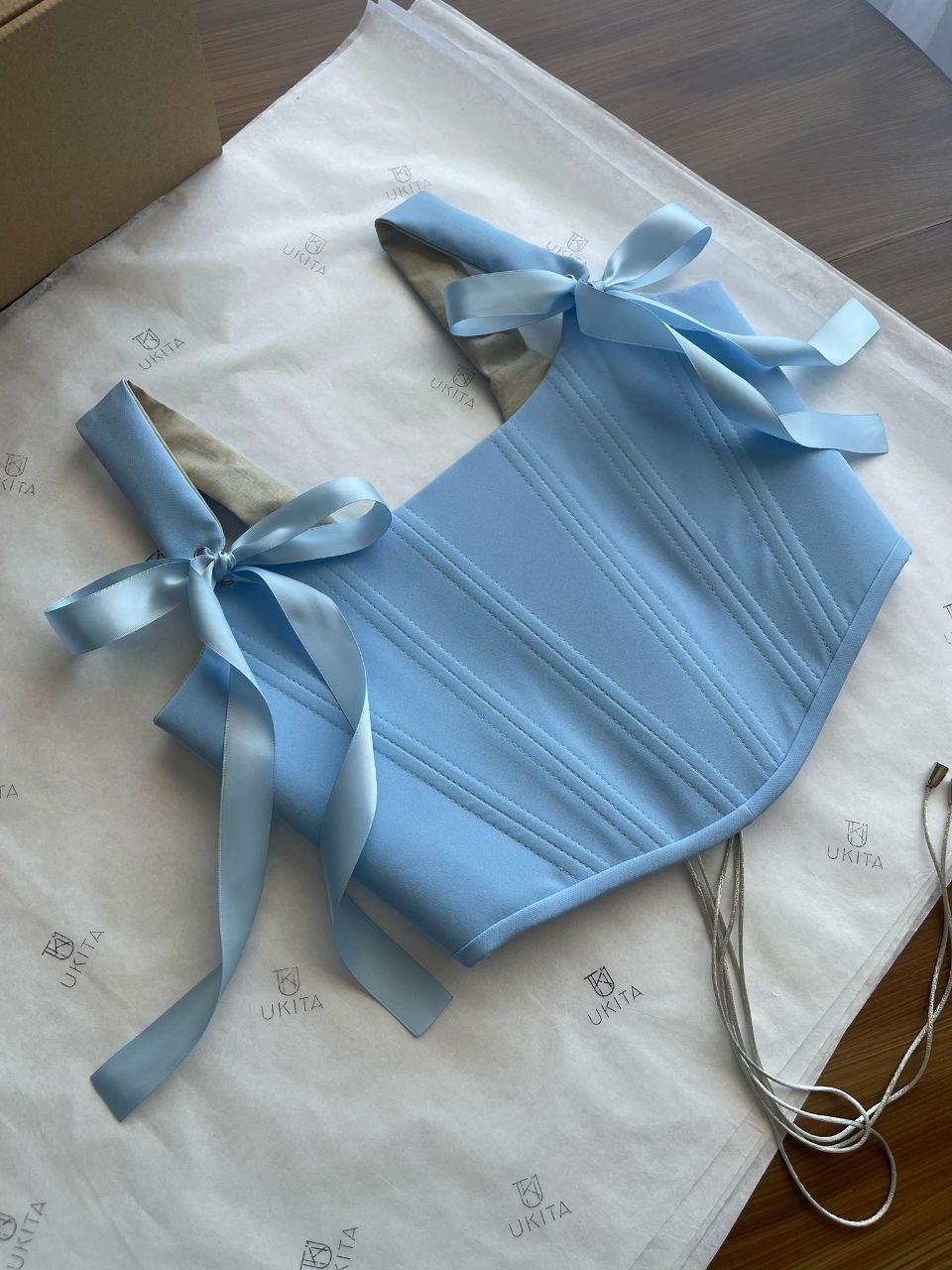 CORSETTO AZZURRO - U K I T A
